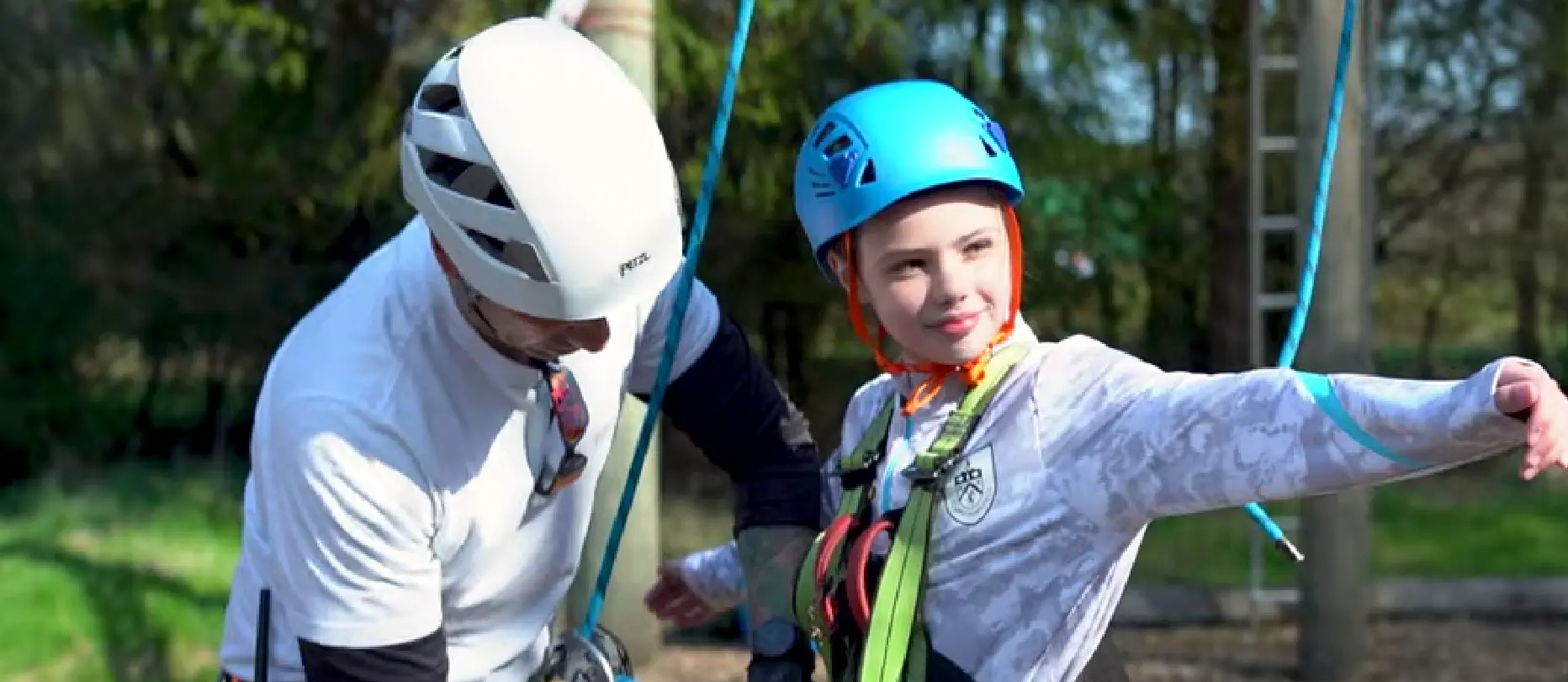 Child in harness from grow school